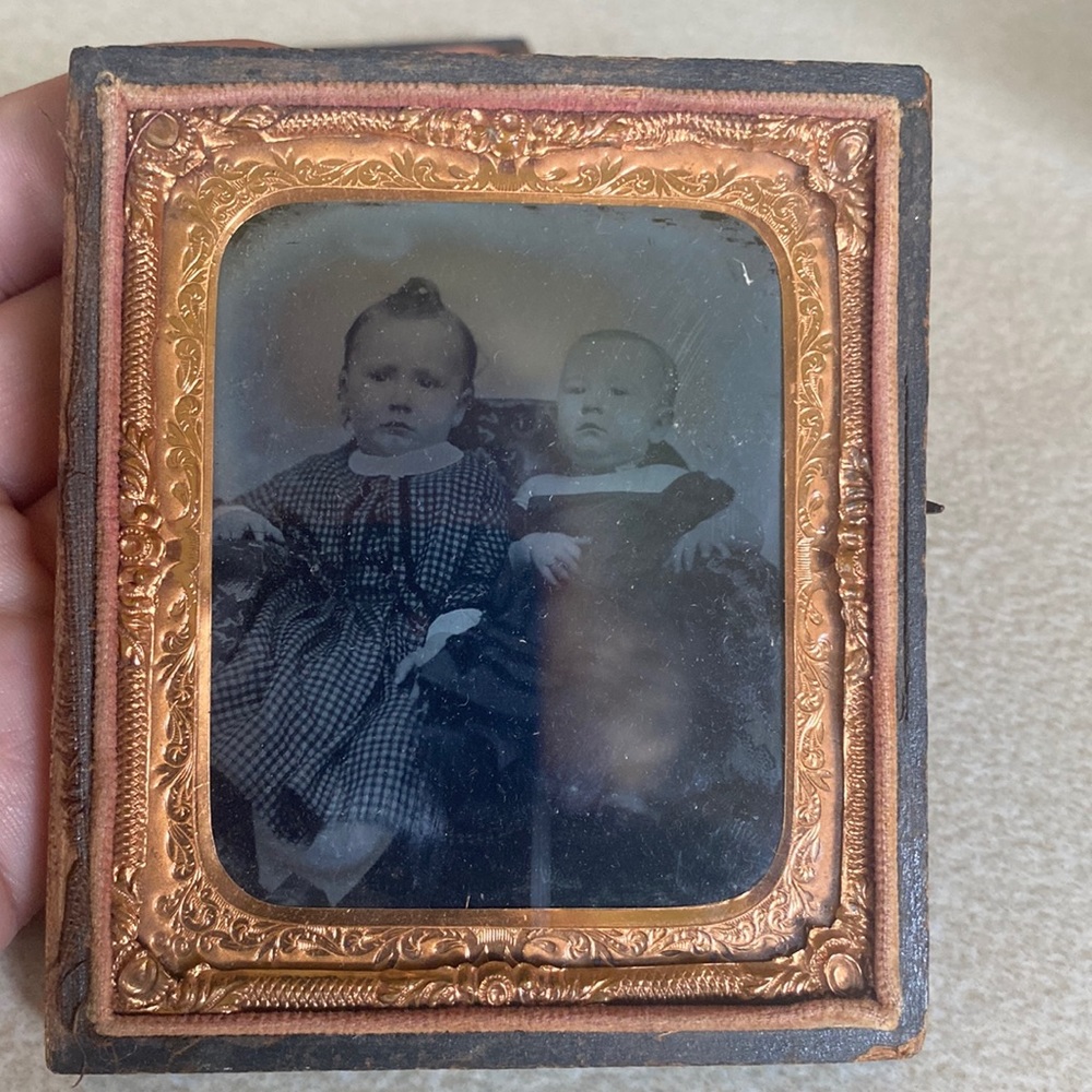 Antique tin type child picture in union case in decorative leather & gold gilt